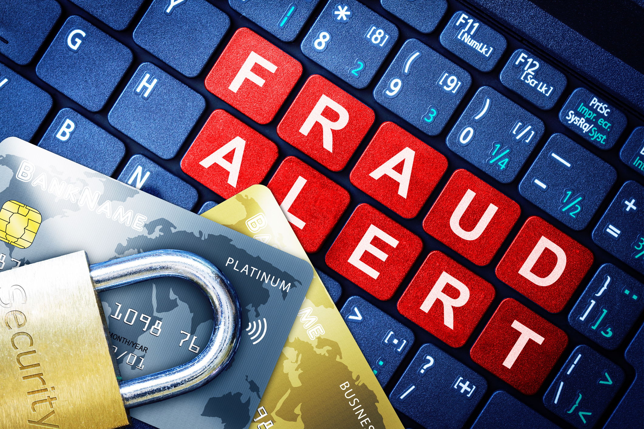 Fraud Alert Concept With Security Lock on Fake Credit Cards Fraud Alert Concept With Security Lock on Fake Credit Cards